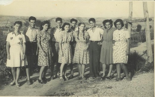 Vera (3rd from left) and Alex (3rd from right) at Ferramonti